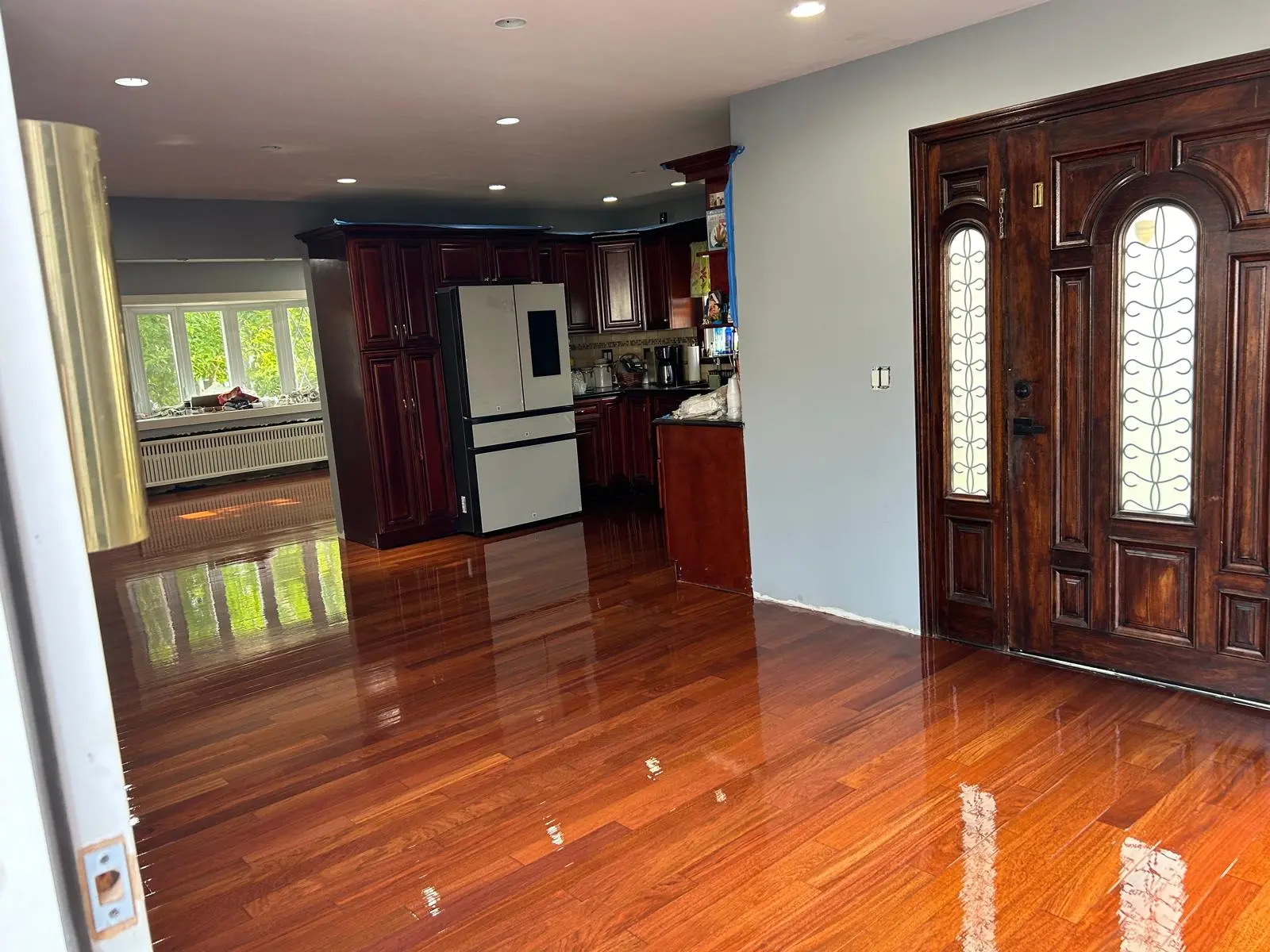 Refinished hardwood floor with a fresh finish
