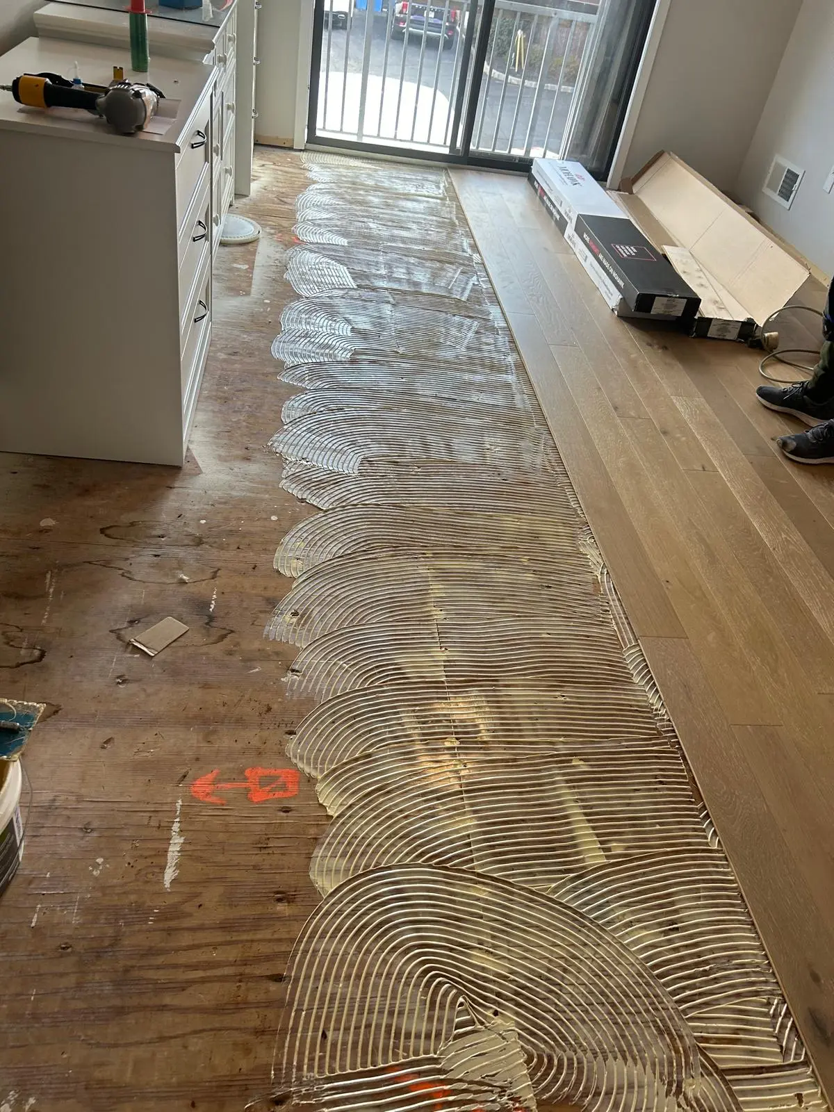 Restored hardwood floor in a bright New Jersey home